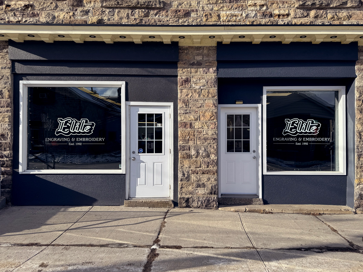 Storefront exterior window signage.